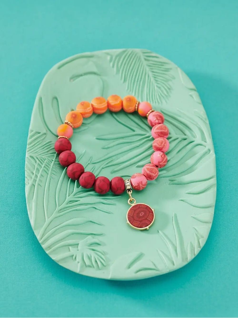 579. Savannah red color block charm bracelet